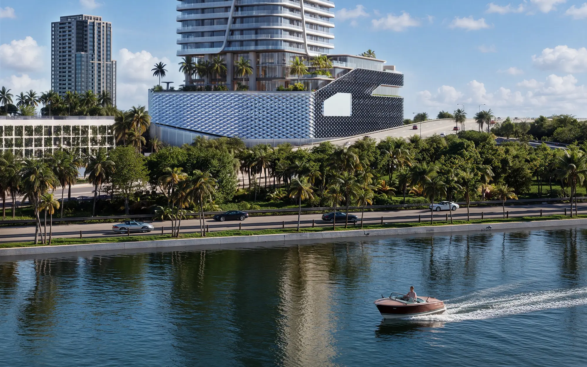 The tower above the waterfront, a boat crossing the bay